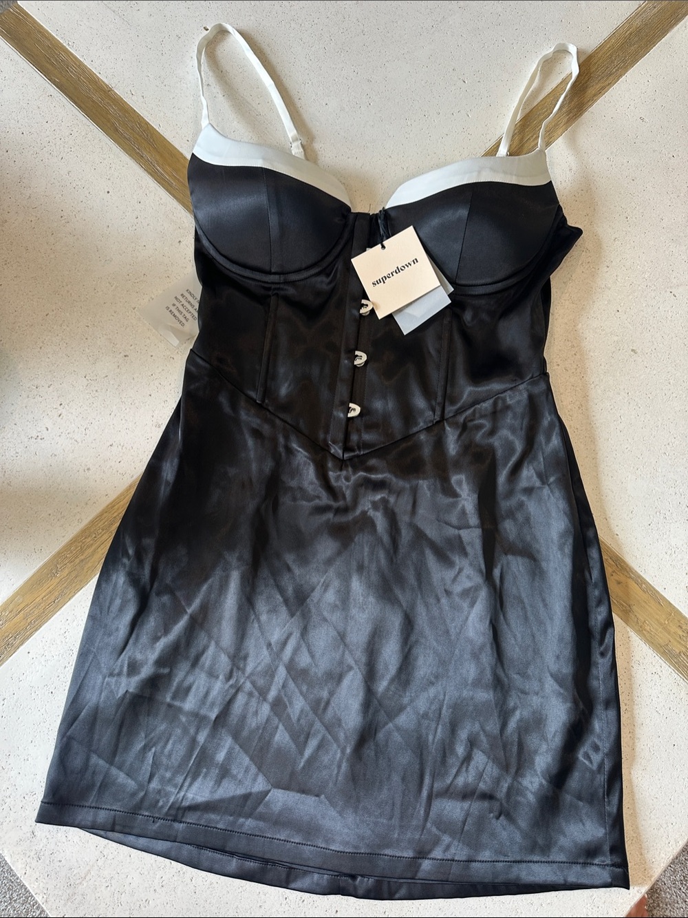 Revolve Superdown black satin mini dress with corset middle and white trim